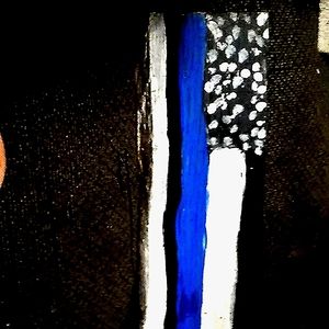 A police  flag made out of wood